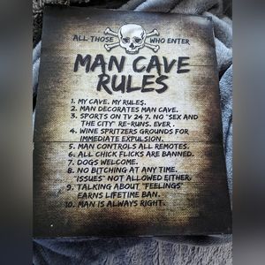 Metal man cave sign